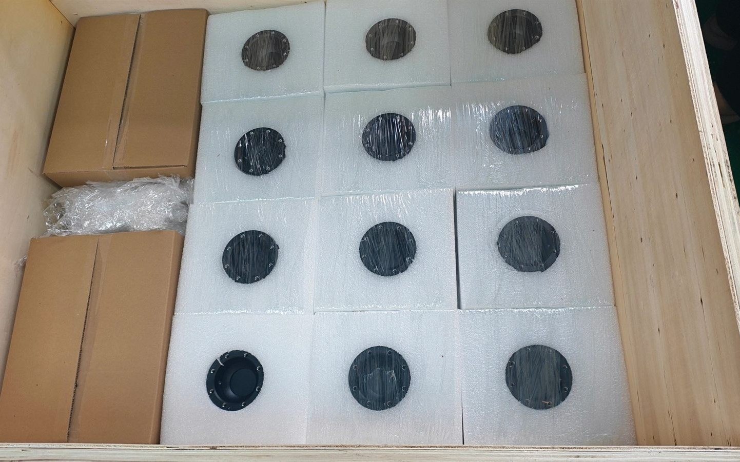 Export crate with foam-packed CNC parts ready for shipment