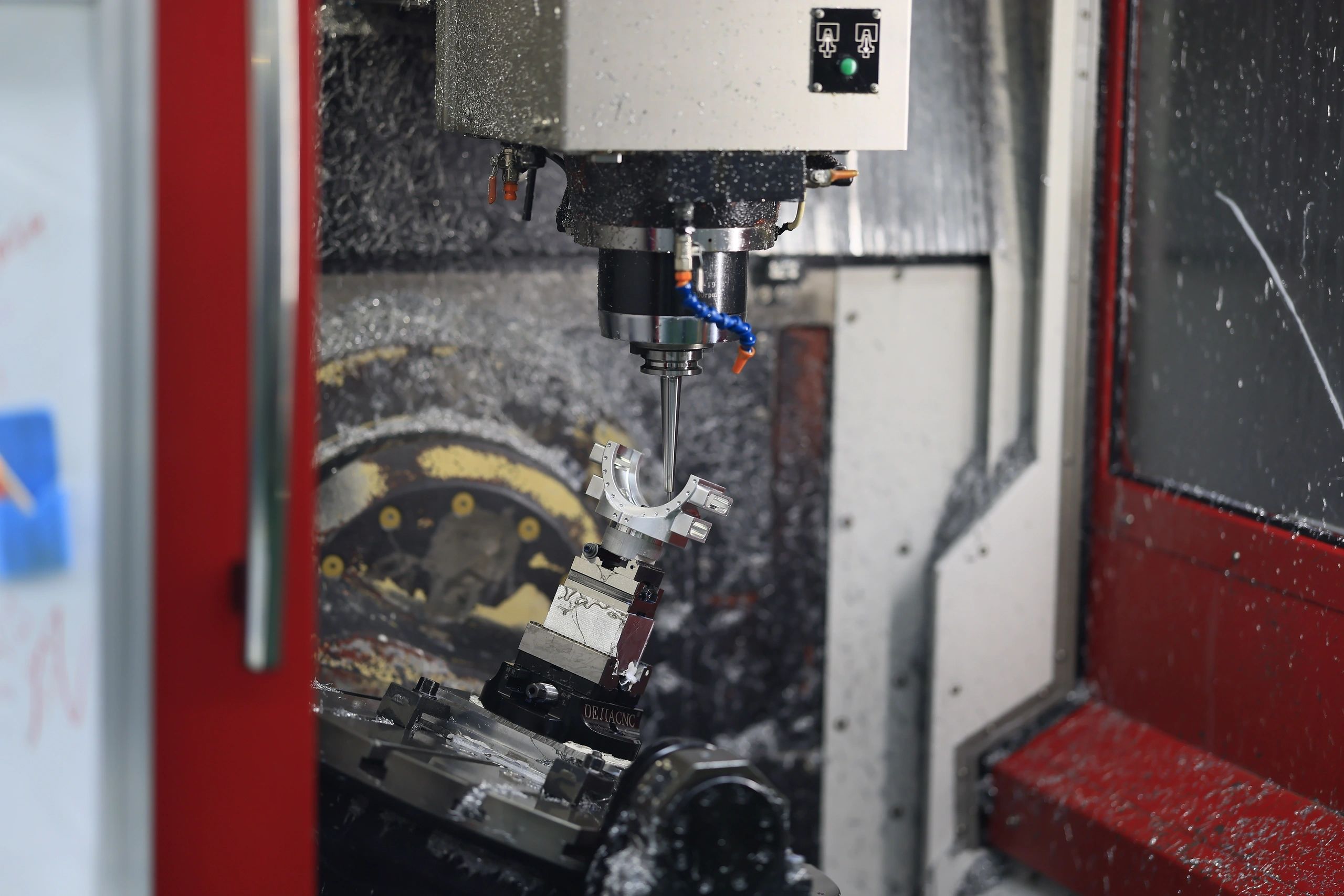 5-axis machined 6061 aluminium split housing component clamped on a fixture
