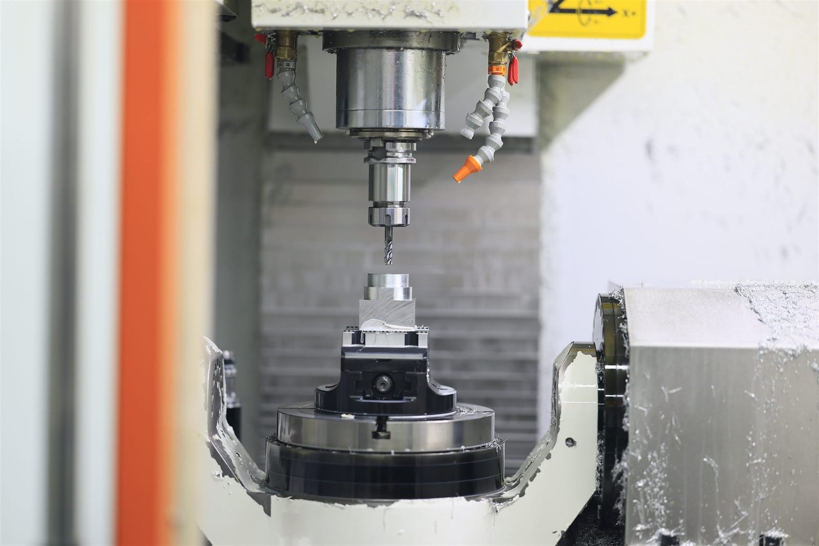 5-axis CNC machining centre milling an aluminium part
