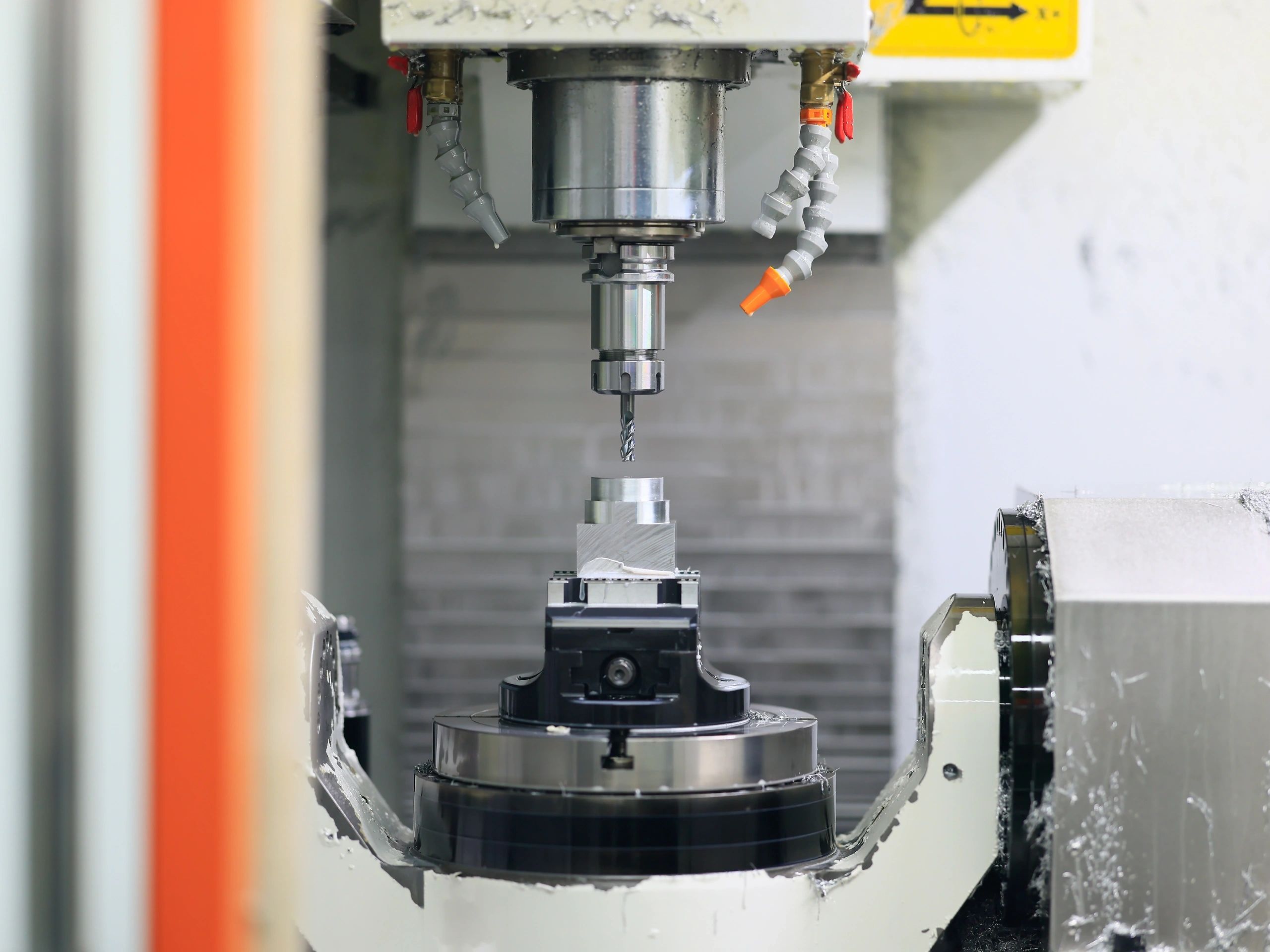 5-axis CNC milling centre machining an aluminium component