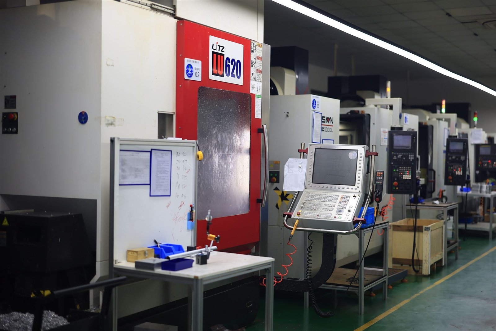 Line of CNC vertical machining centres at Fenva Precision